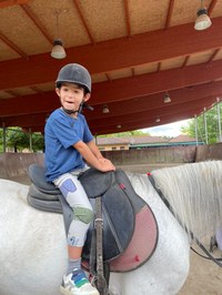 Participante durante el taller de equitación.